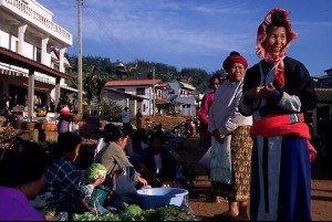 Women in tribal clothes at the Huay Xai market. Laos